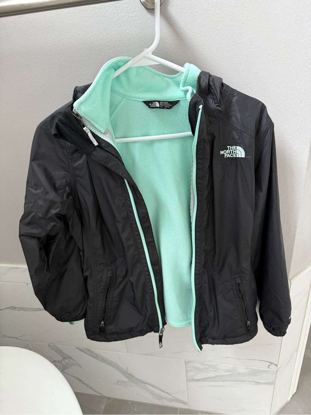 Girls The North Face Black Rain Jacket with Mint Fleece Liner